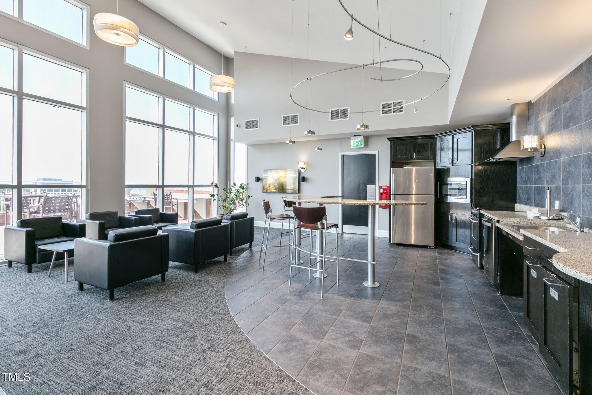 400 West North Street, Unit 1134 Raleigh, NC 27603 - Photo 30 of 39 a living room with furniture kitchen view and a large window