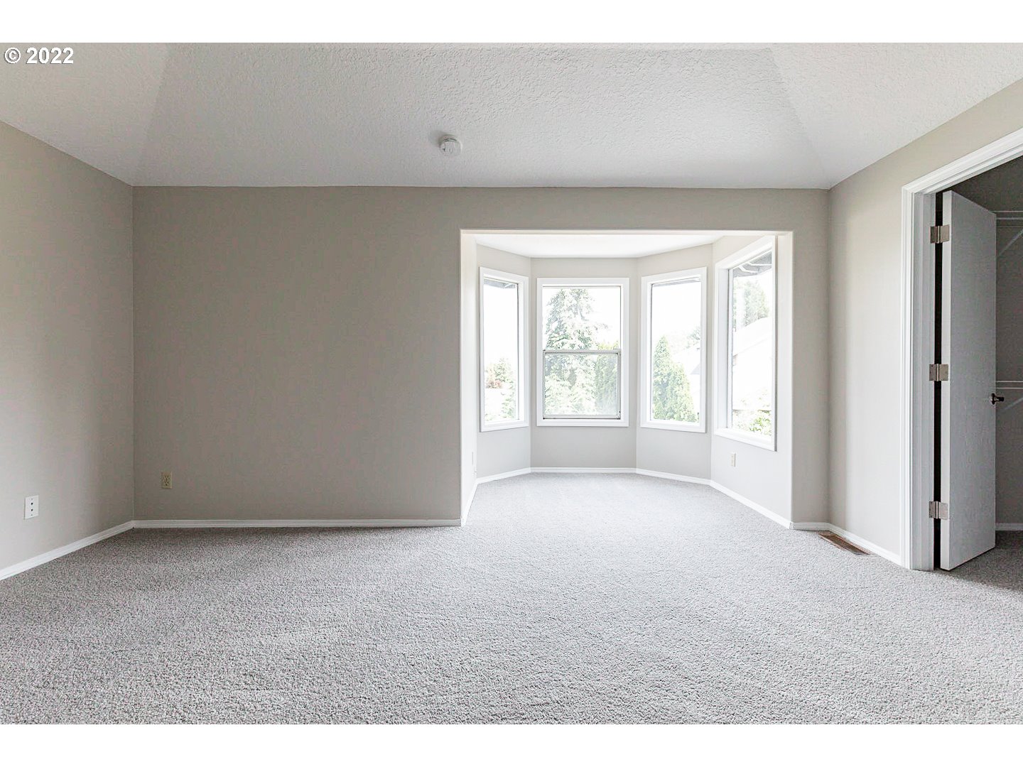 7354 Southwest 166th Terrace Beaverton, OR 97007 - Photo 16 of 32 a view of an empty room with a window