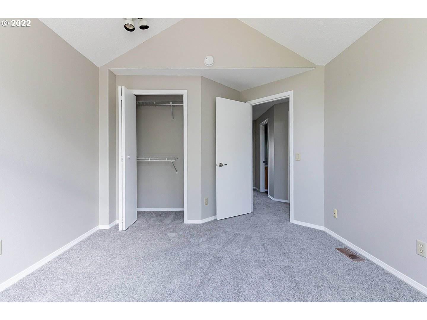7354 Southwest 166th Terrace Beaverton, OR 97007 - Photo 19 of 32 an empty room with closet and a bathroom