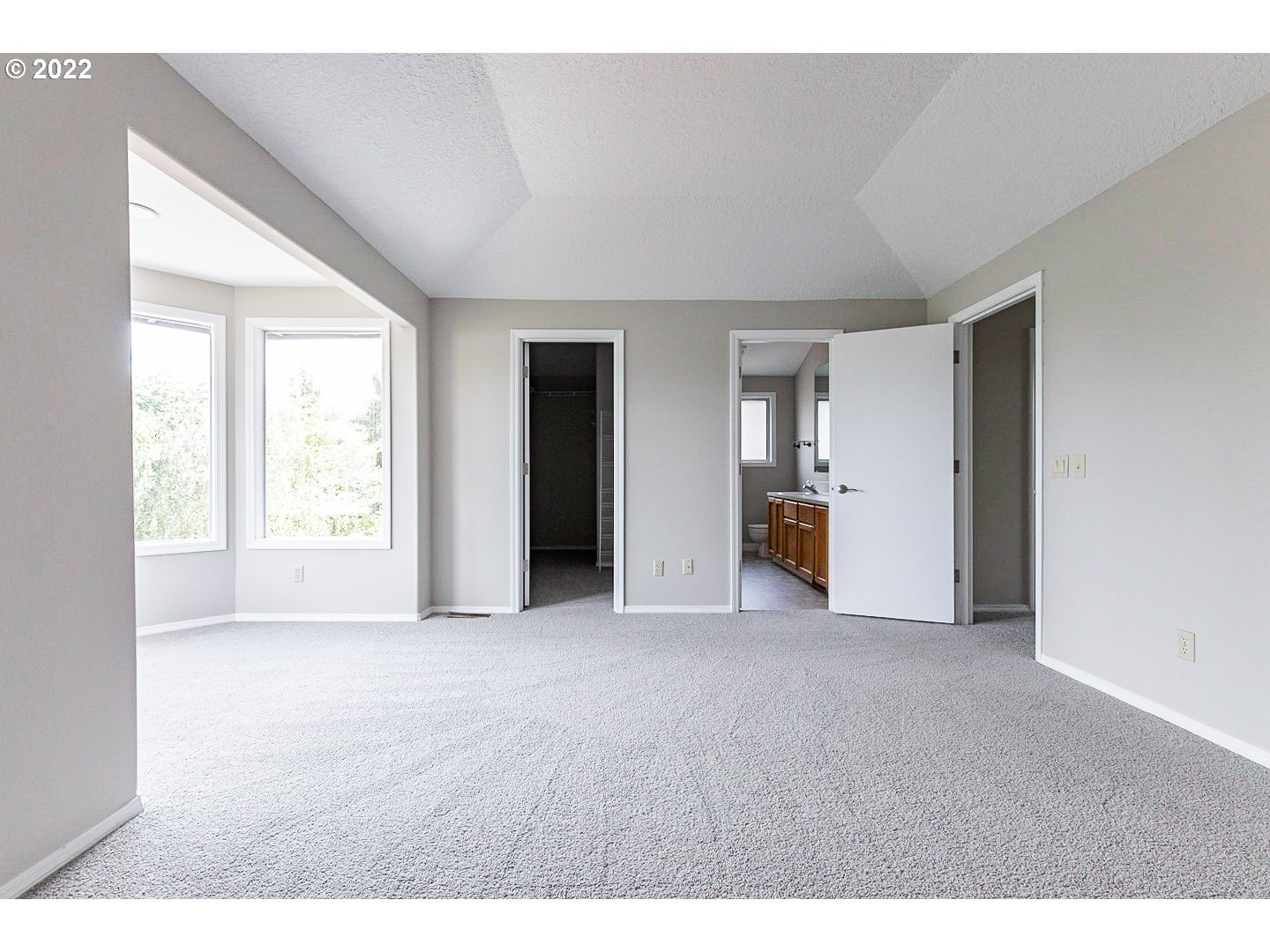 7354 Southwest 166th Terrace Beaverton, OR 97007 - Photo 22 of 32 a view of empty room with wooden floor
