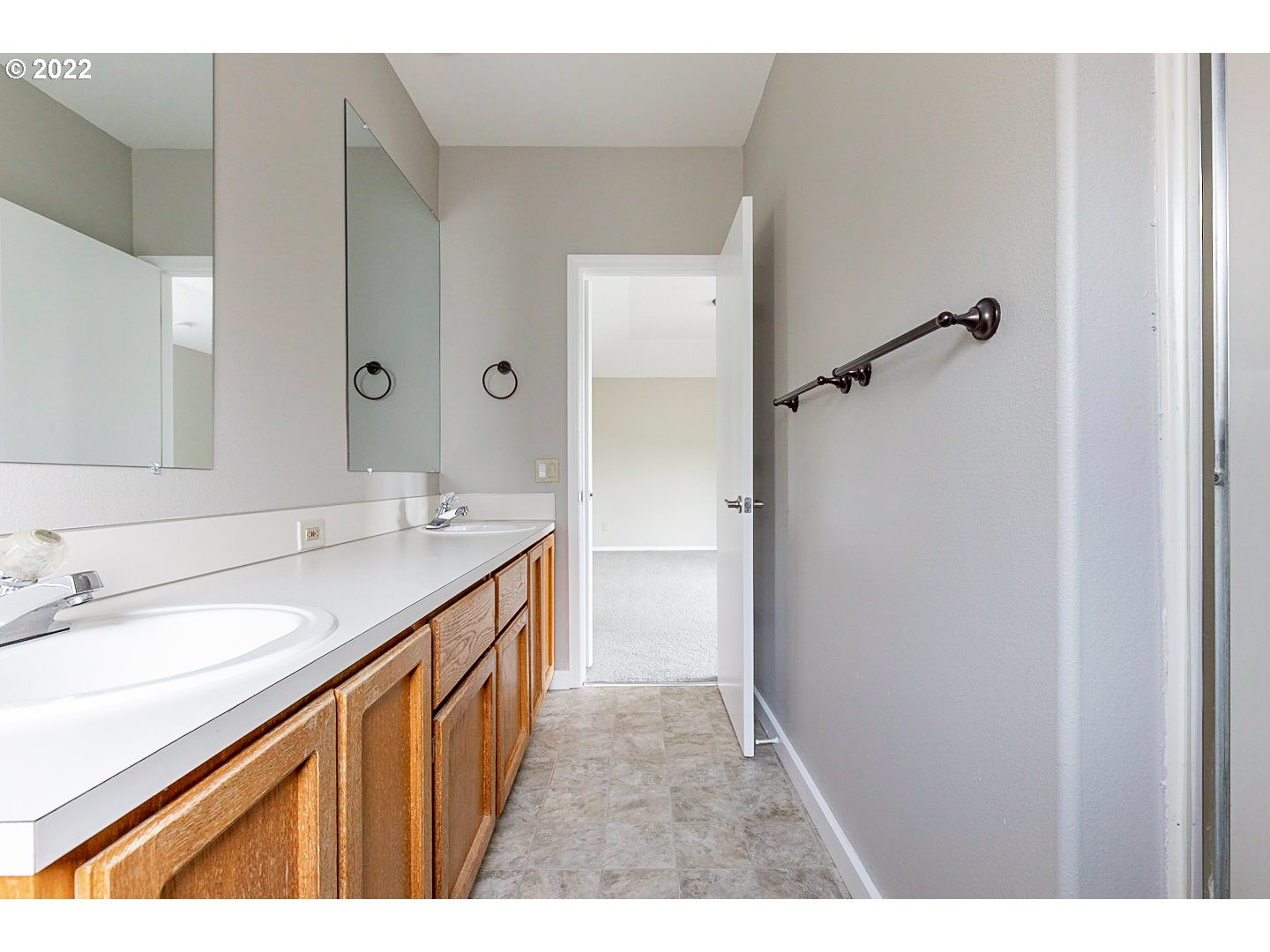 7354 Southwest 166th Terrace Beaverton, OR 97007 - Photo 26 of 32 a bathroom with a sink a mirror and a shower