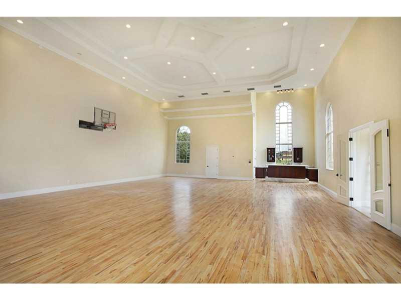 13607 Bella Ranch Lane Southwest Ranches, FL 33330 - Photo 14 of 19 a view of empty room with wooden floor