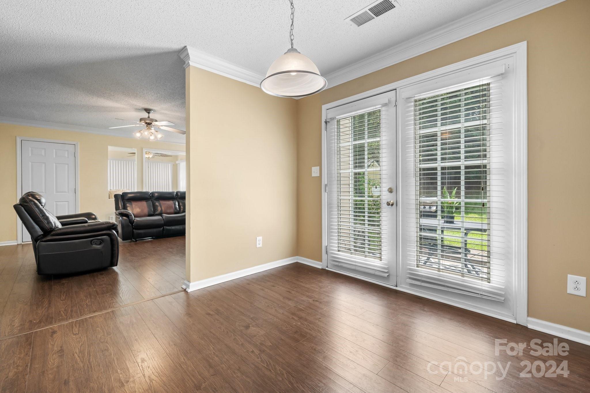 813 Raindrops Road Gastonia, NC 28054 - Photo 15 of 42 a living room with furniture and a window