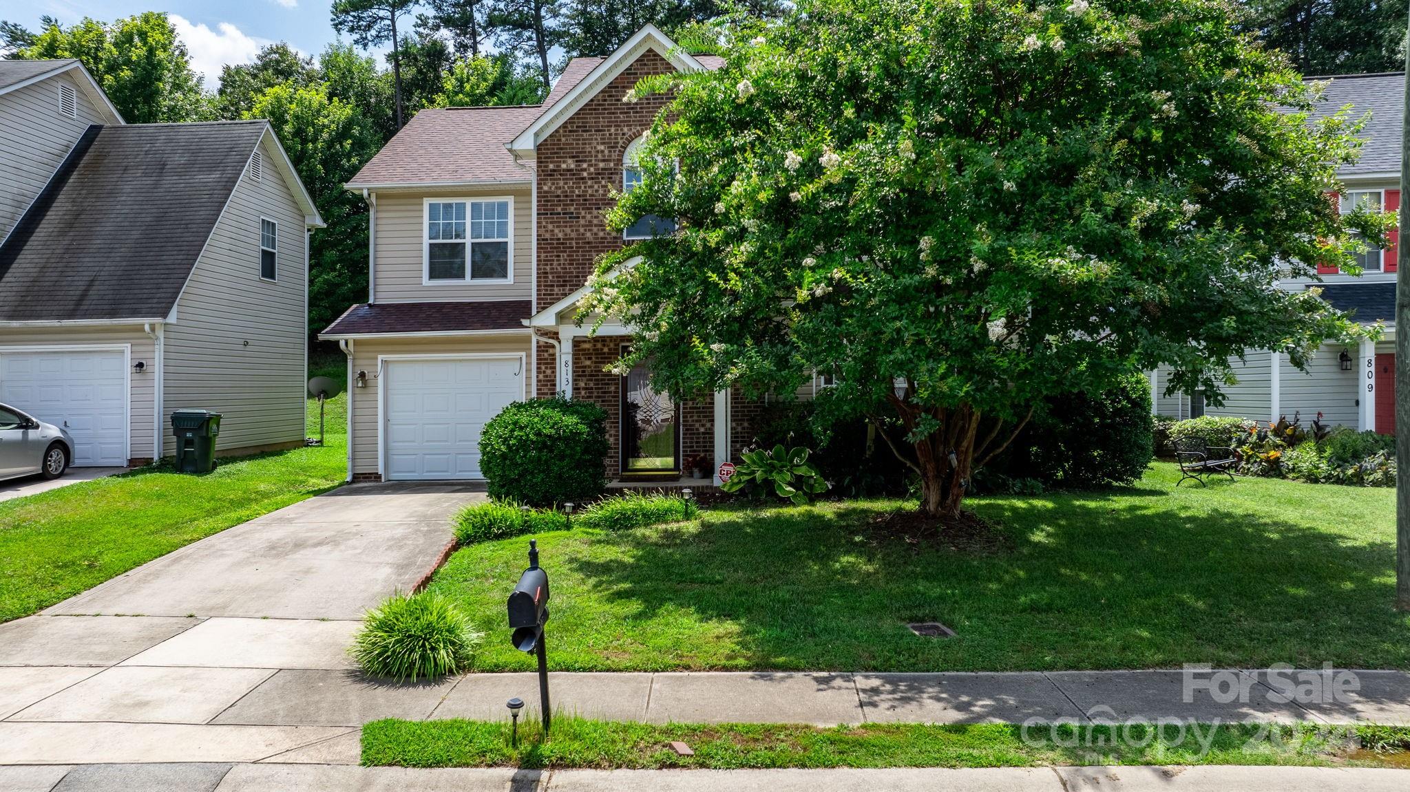 813 Raindrops Road Gastonia, NC 28054 - Photo 2 of 42 a front view of a house with a yard