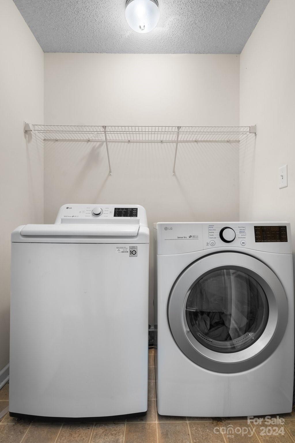 813 Raindrops Road Gastonia, NC 28054 - Photo 25 of 42 a utility room with dryer and washer