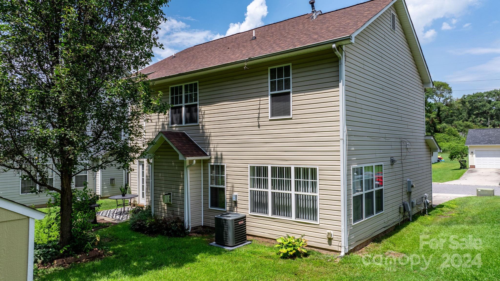 813 Raindrops Road Gastonia, NC 28054 - Photo 36 of 42 a view of house with backyard and garden