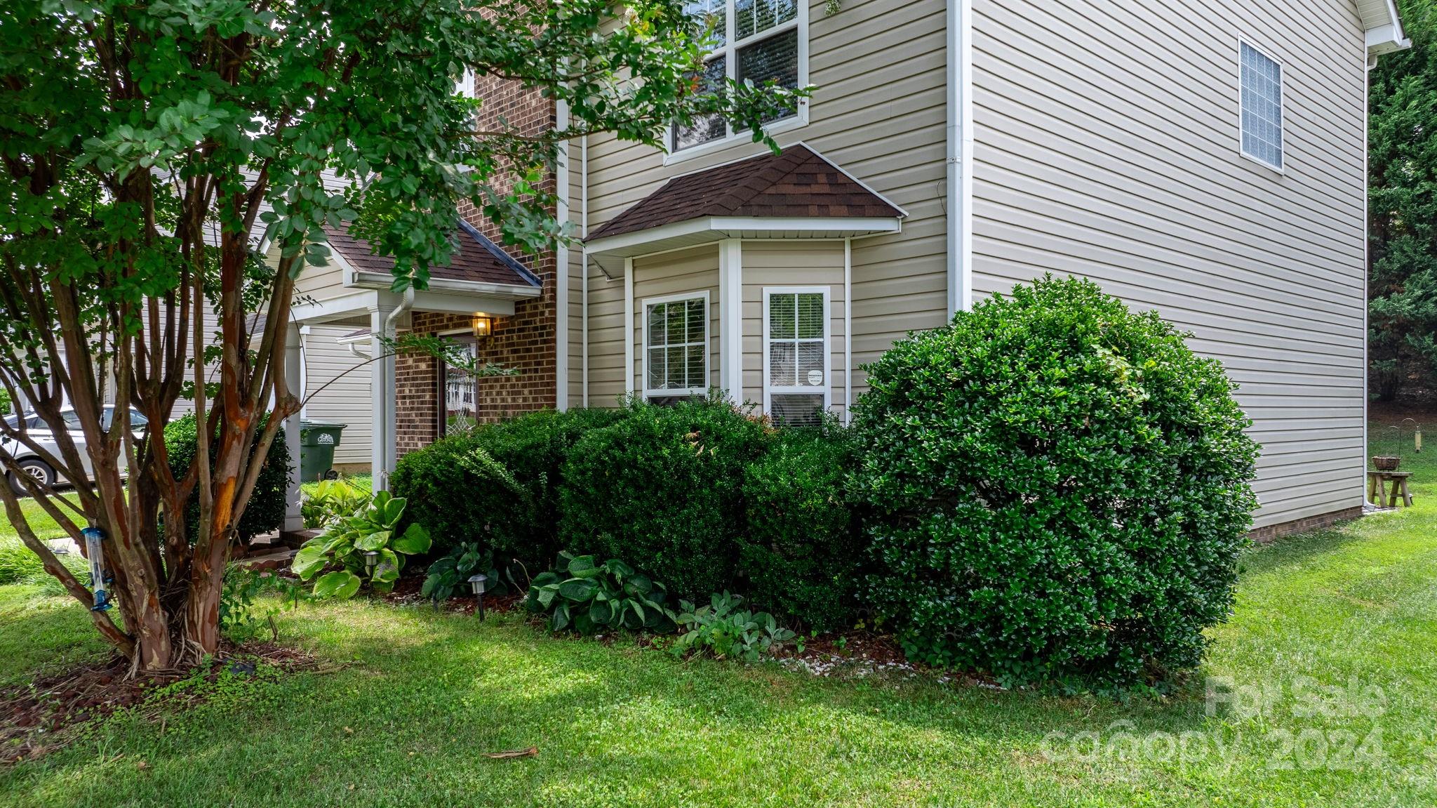 813 Raindrops Road Gastonia, NC 28054 - Photo 4 of 42 a front view of a house with a yard