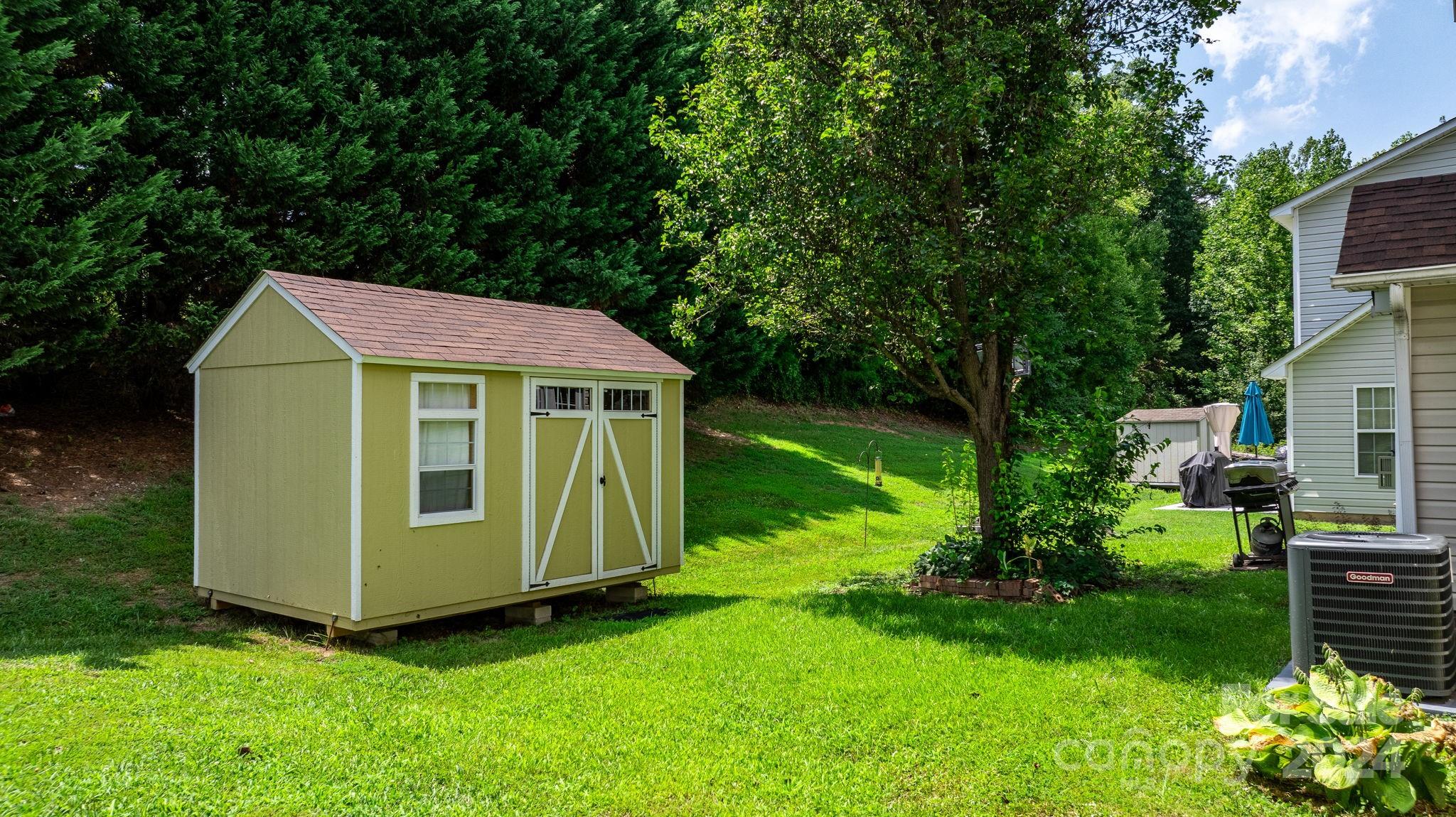 813 Raindrops Road Gastonia, NC 28054 - Photo 7 of 42 a view of a yard with plants