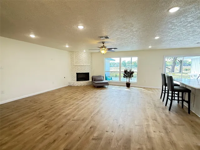 a view of a livingroom with furniture and a table