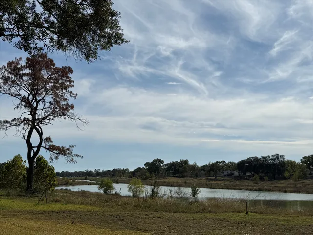 a view of lake with mountain