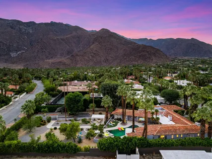 an aerial view of residential house with outdoor space