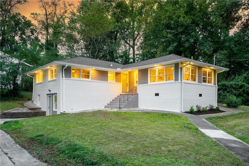 543 Marktwo Place Northwest Atlanta, GA 30318 - Photo 1 of 1 a front view of house with yard and green space