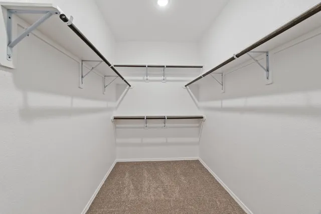 a view of a room with racks on the wall