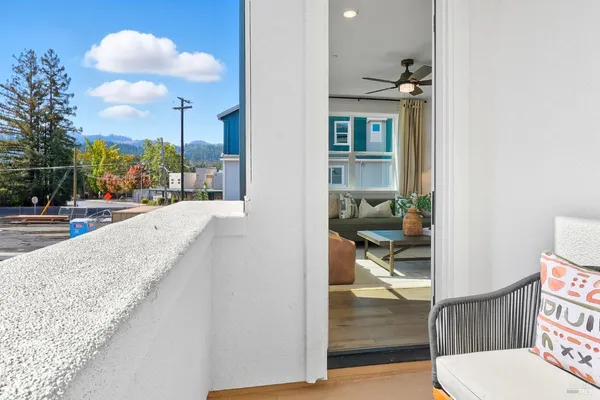 a view of living room and kitchen