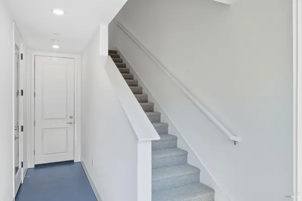 a view of entryway with wooden floor