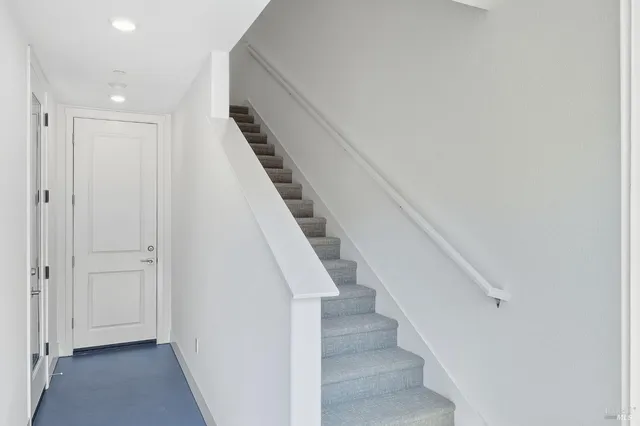 a view of entryway with wooden floor
