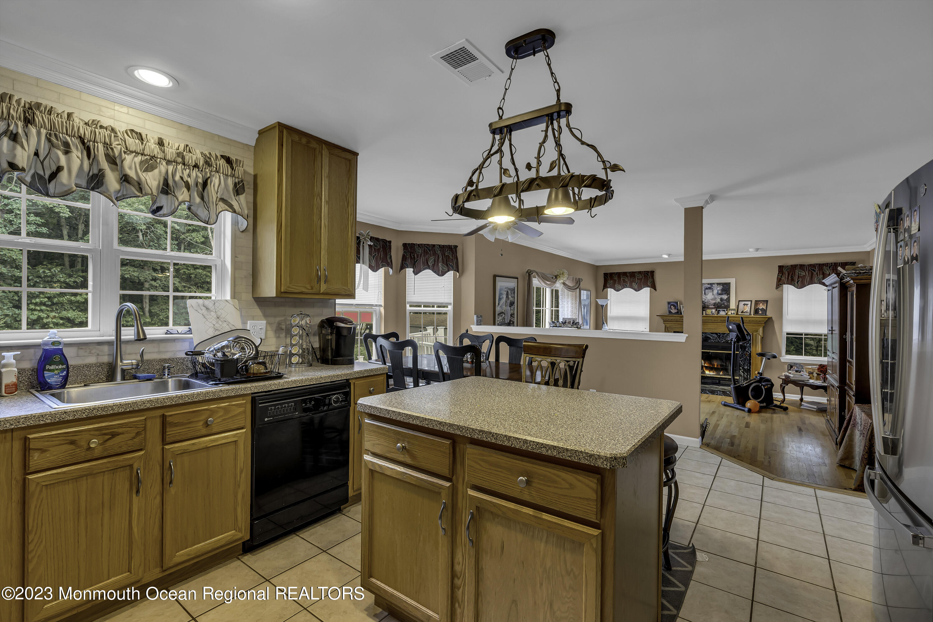 229 Lanes Mill Road Howell, NJ 07731 - Photo 11 of 58 a kitchen with a sink a counter space appliances and cabinets
