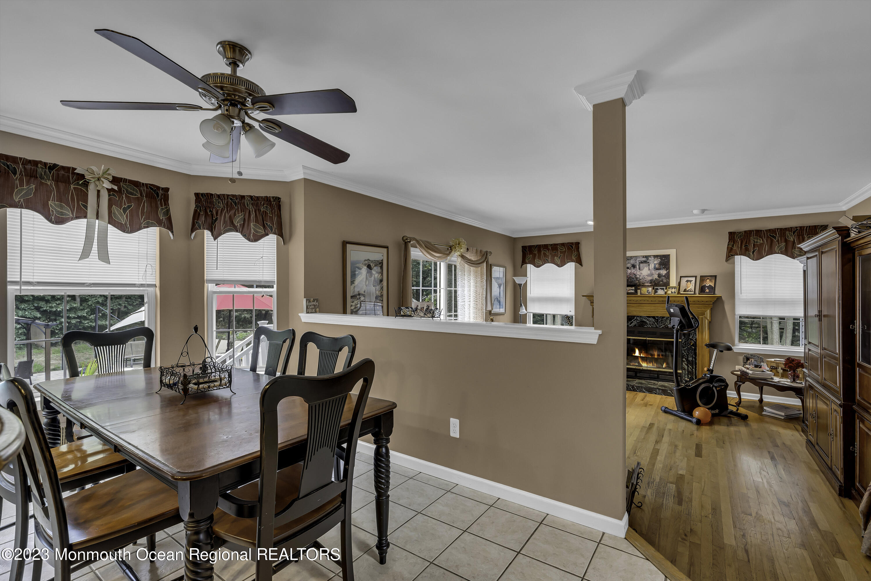 229 Lanes Mill Road Howell, NJ 07731 - Photo 14 of 58 a dining room with furniture window entryway and wooden floor