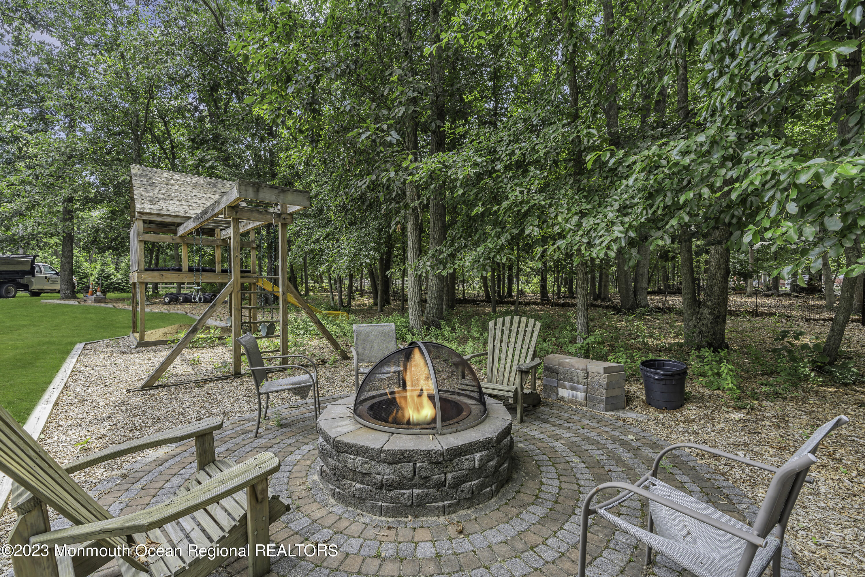 229 Lanes Mill Road Howell, NJ 07731 - Photo 47 of 58 a view of backyard with swimming pool and outdoor seating