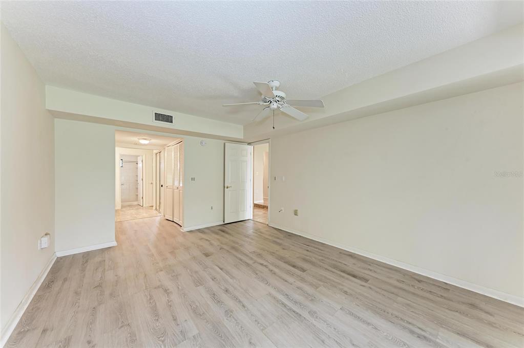 5362 Huntingwood Court, Unit 16 Sarasota, FL 34235 - Photo 22 of 46 wooden floor in an empty room