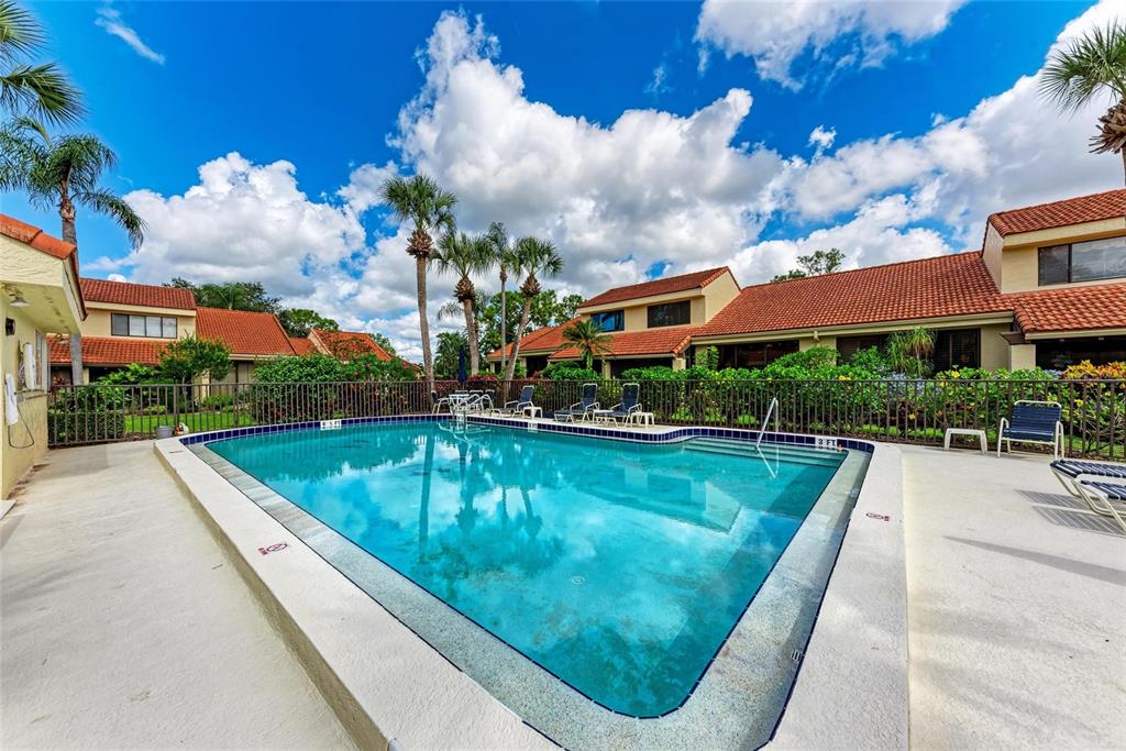 5362 Huntingwood Court, Unit 16 Sarasota, FL 34235 - Photo 43 of 46 a view of swimming pool from a balcony