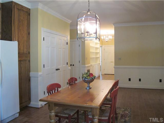 3428 Harden Road Raleigh, NC 27607 - Photo 5 of 12 a view of a dining room with furniture