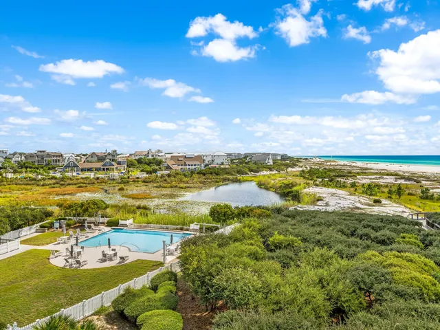 a view of a lake with a big yard