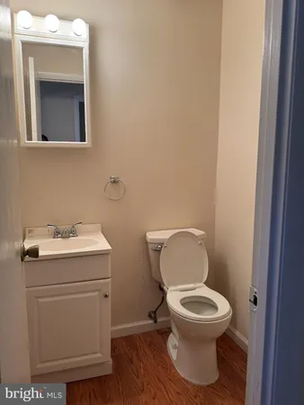 a bathroom with a shower and a mirror