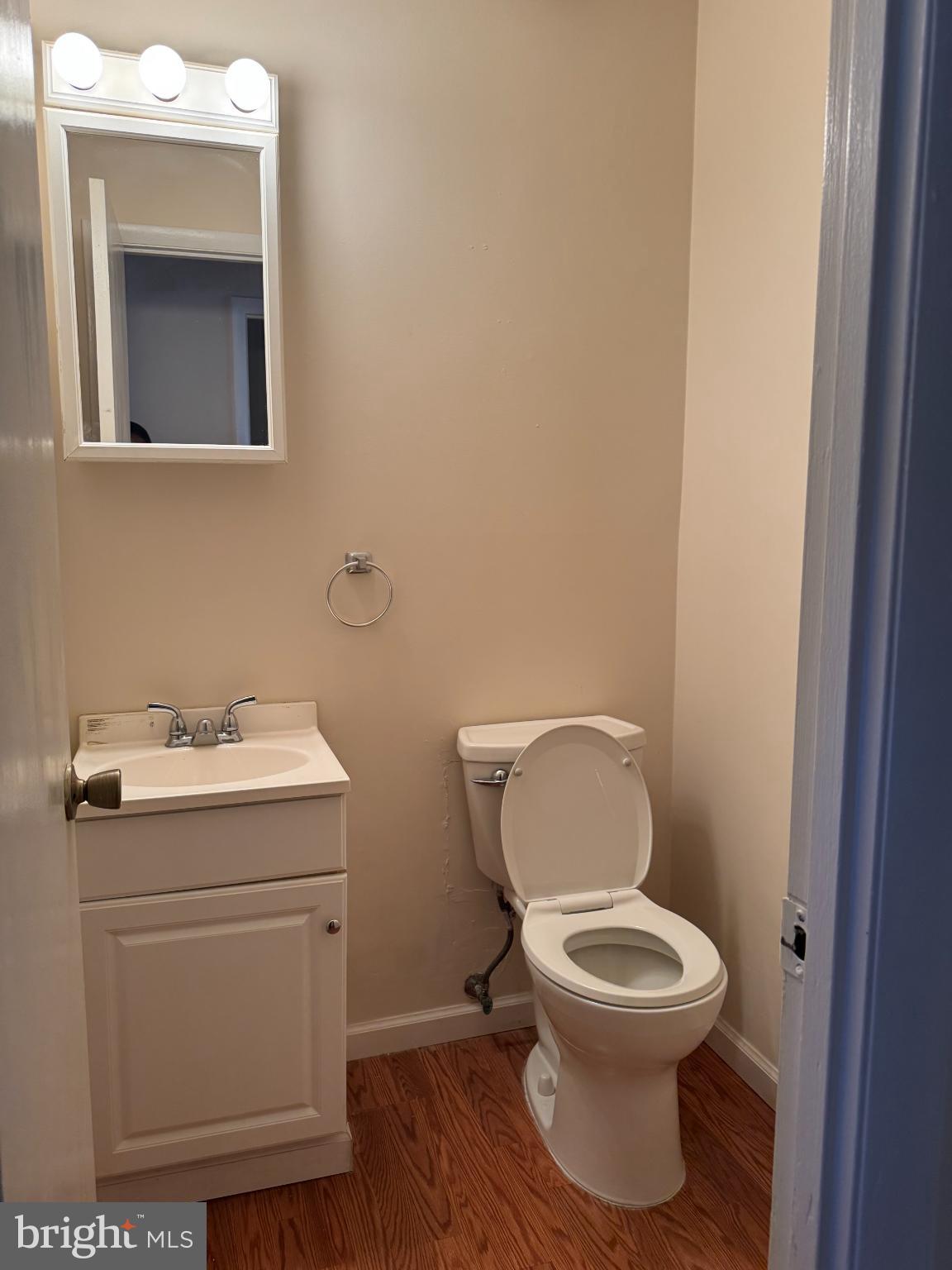 1823 Jaybird Court Severn, MD 21144 - Photo 14 of 21 a white toilet sitting next to a bathroom sink