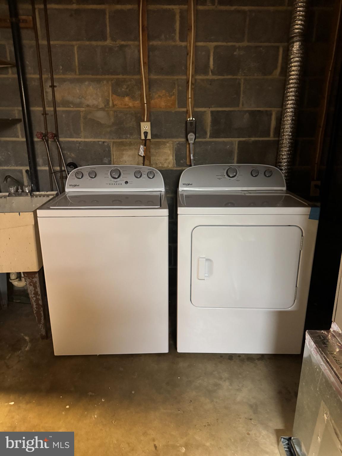 1823 Jaybird Court Severn, MD 21144 - Photo 19 of 21 a utility room with dryer and washer