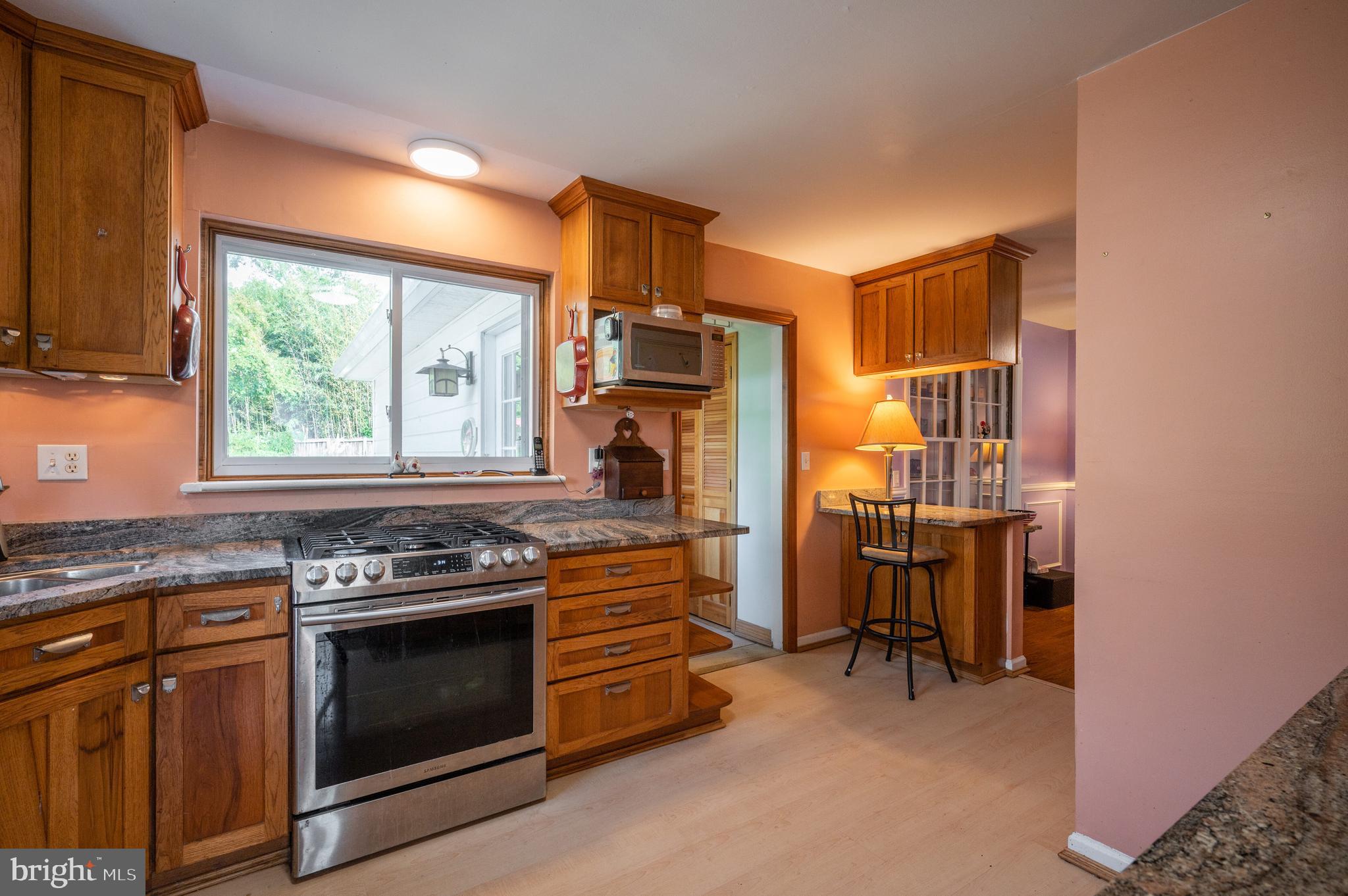 8003 Fairfax Road Alexandria, VA 22308 - Photo 8 of 35 Easy cooking on a gas Samsung stove with a view