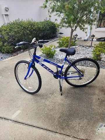 a backyard of a house with outdoor seating