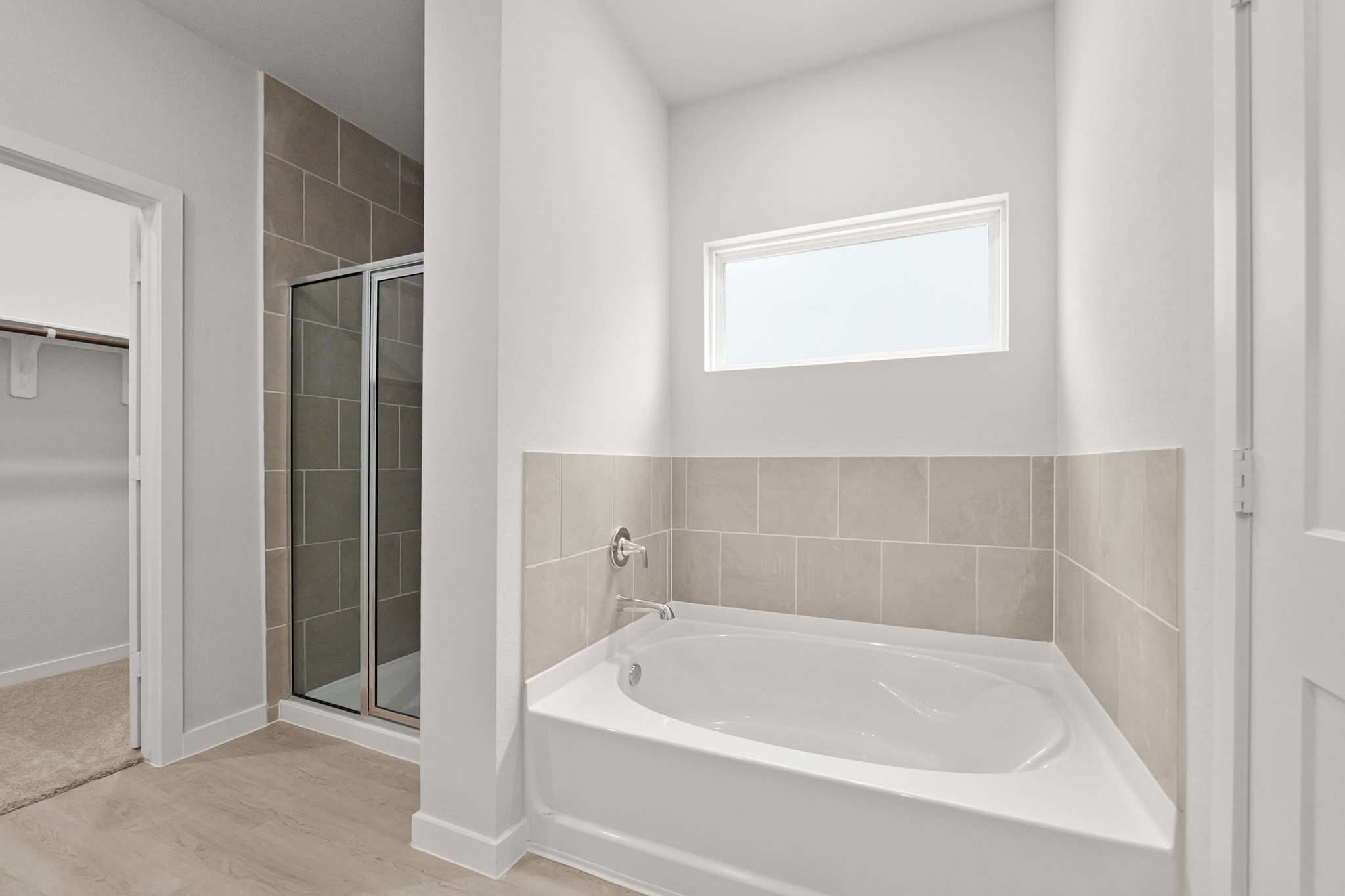 4414 Albritton Avenue Bryan, TX 77845 - Photo 25 of 34 a white bath tub sitting in a bathroom