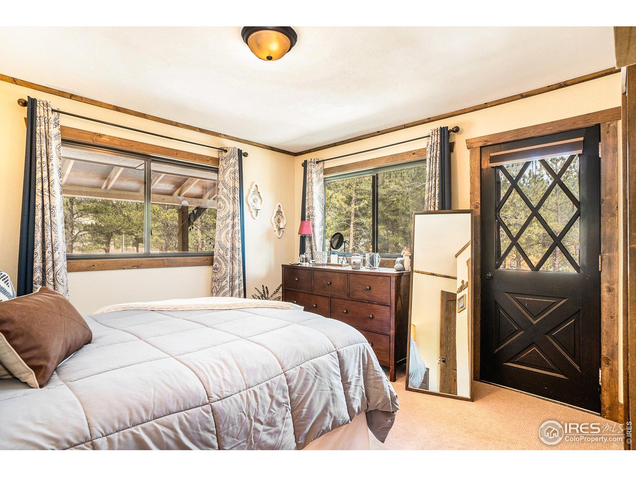 456 St Vrain Road Lyons, CO 80540 - Photo 16 of 40 Primary Bedroom with private balcony