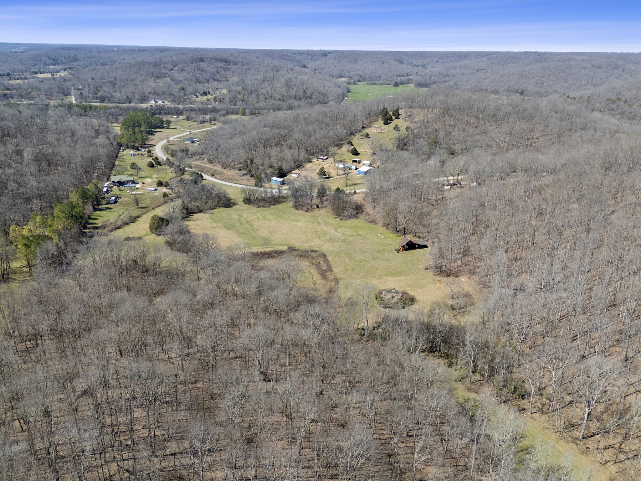 651 Liberty Circle Prospect, TN 38477 - Photo 17 of 24 a view of a dry yard with trees