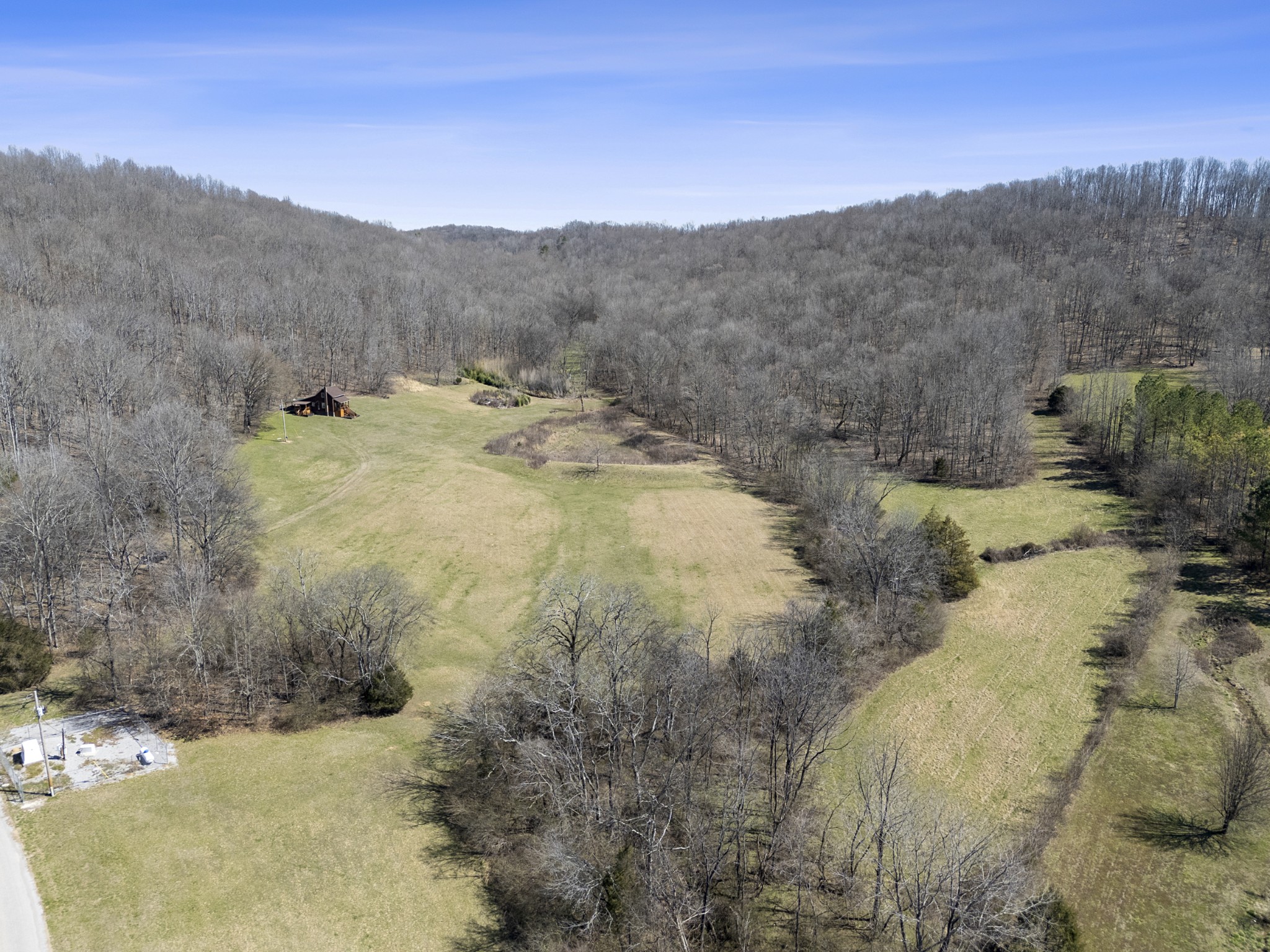 651 Liberty Circle Prospect, TN 38477 - Photo 22 of 24 a view of a yard with mountains in the background