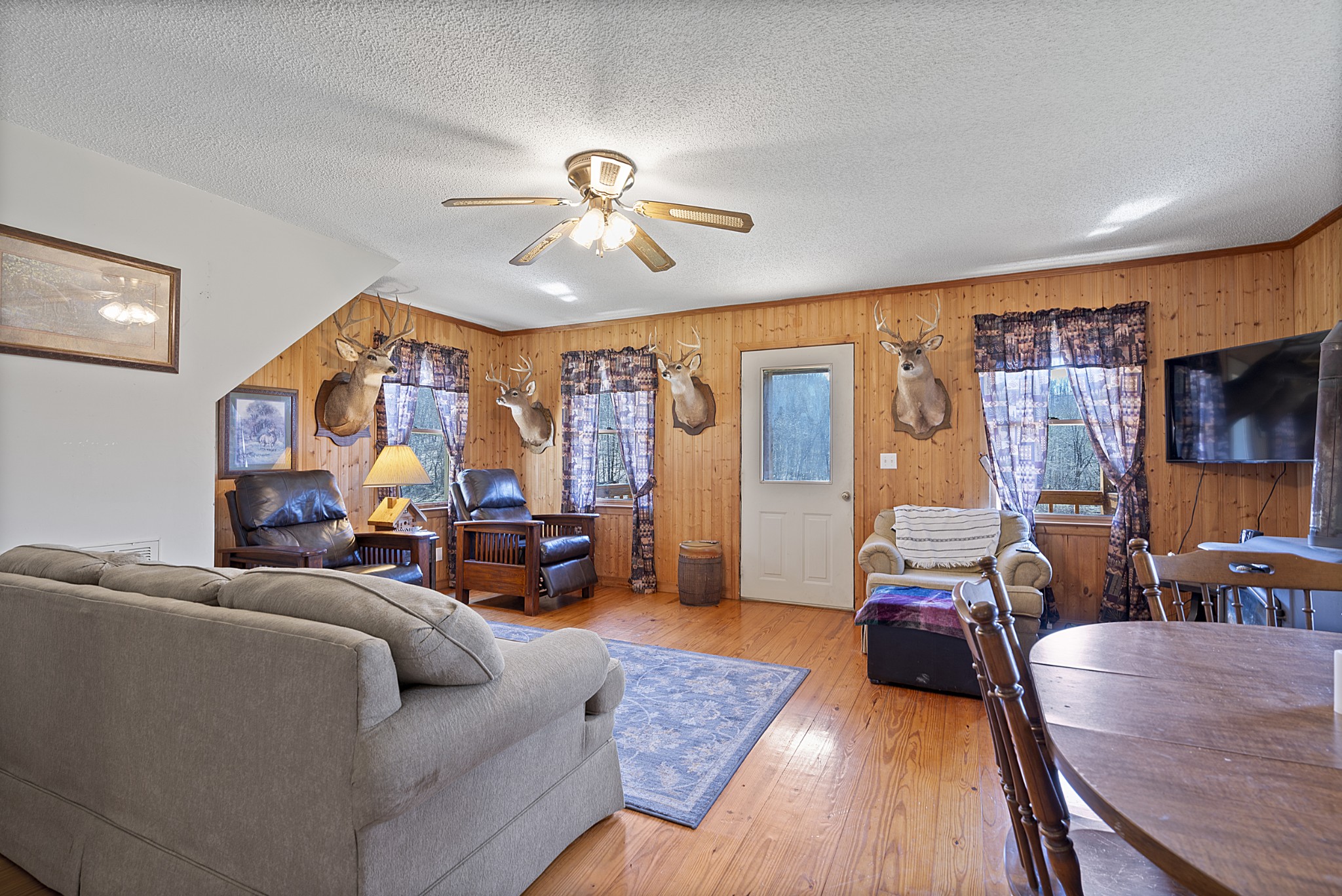 651 Liberty Circle Prospect, TN 38477 - Photo 4 of 24 a living room with furniture and a flat screen tv