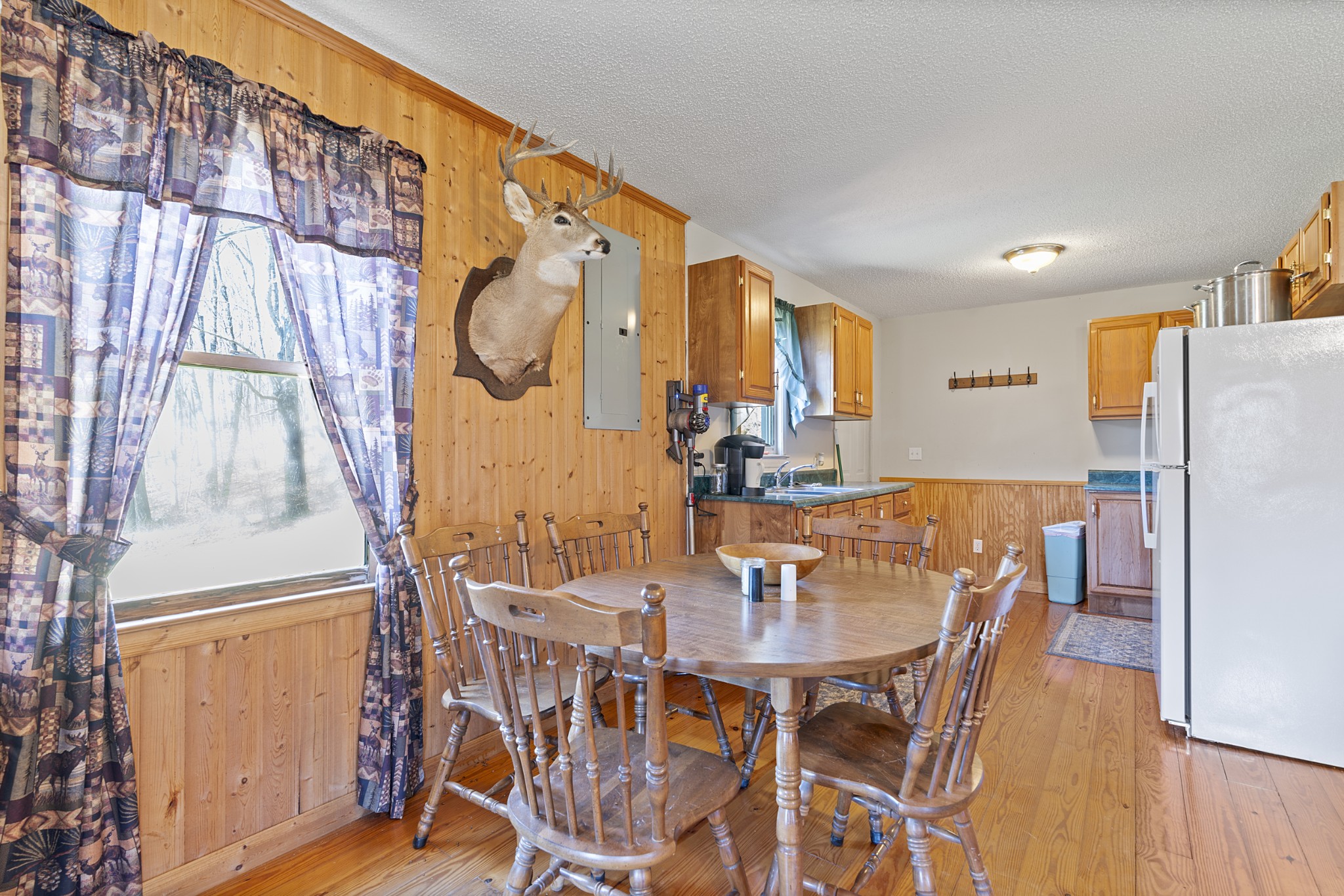 651 Liberty Circle Prospect, TN 38477 - Photo 5 of 24 a view of a dining room with furniture and wooden floor