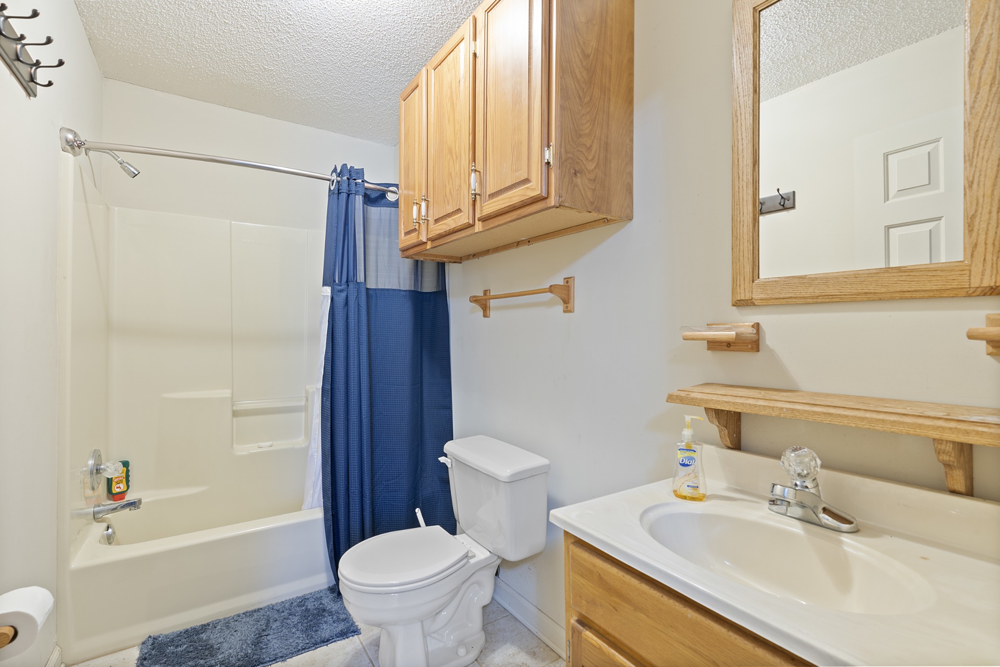 651 Liberty Circle Prospect, TN 38477 - Photo 8 of 24 a bathroom with a sink toilet and shower