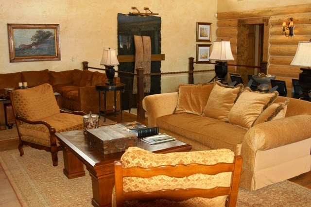 1090 Hull Ridge Road Montrose, CO 81403 - Photo 3 of 9 a living room with furniture and a lamp