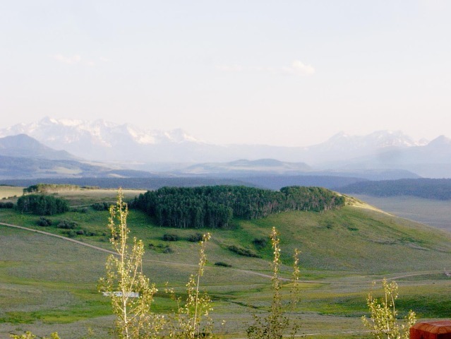 1090 Hull Ridge Road Montrose, CO 81403 - Photo 8 of 9 a view of a lake in middle of the town