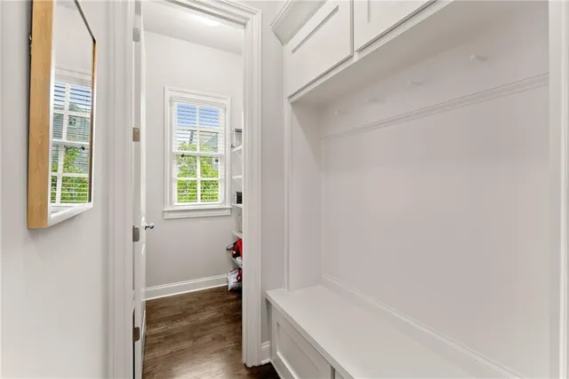 a view of sign board with racks on wall