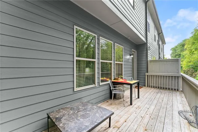 a view of multiple houses with a street