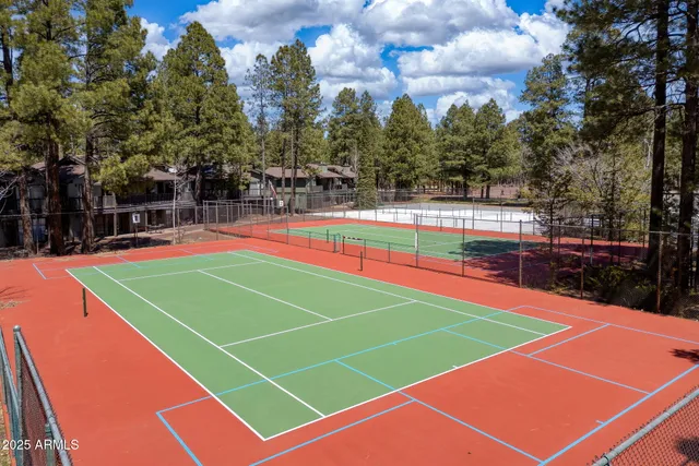a tennis court that has tennis net