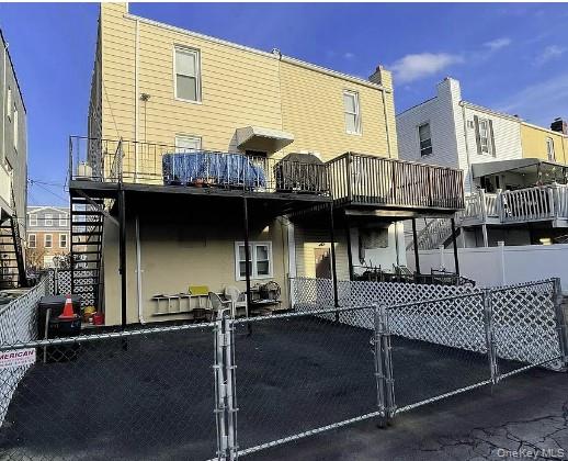 249 Calhoun Avenue Bronx, NY 10465 - Photo 11 of 11 a view of a house with wooden deck