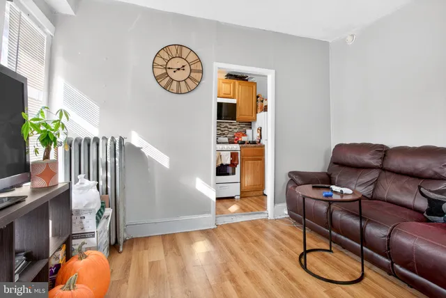 a view of a livingroom with furniture and wooden floor