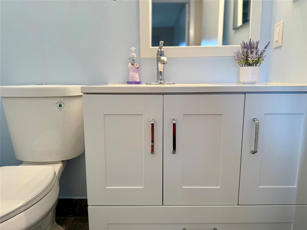 417 Mansfield I, Unit 417 Boca Raton, FL 33434 - Photo 20 of 37 Half Bathroom