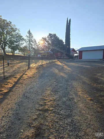 a view of a yard with a slide