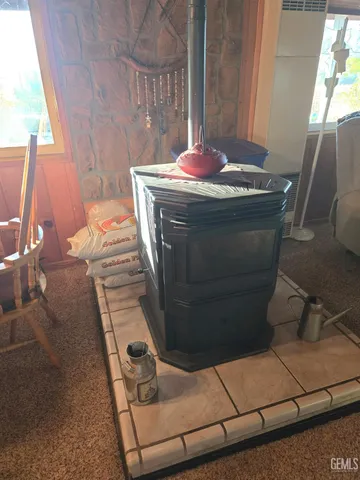 a bedroom with a bed and a large mirror