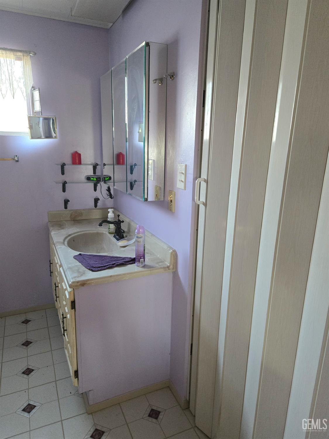 Undisclosed Address Caliente, CA 93518 - Photo 21 of 33 a bathroom with a sink toilet and mirror